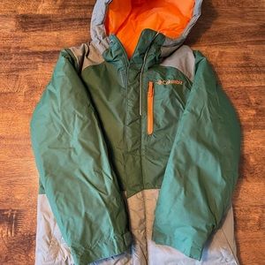 Columbia Coat is in great  condition. Green and Orange  and is a size XS 5/6.